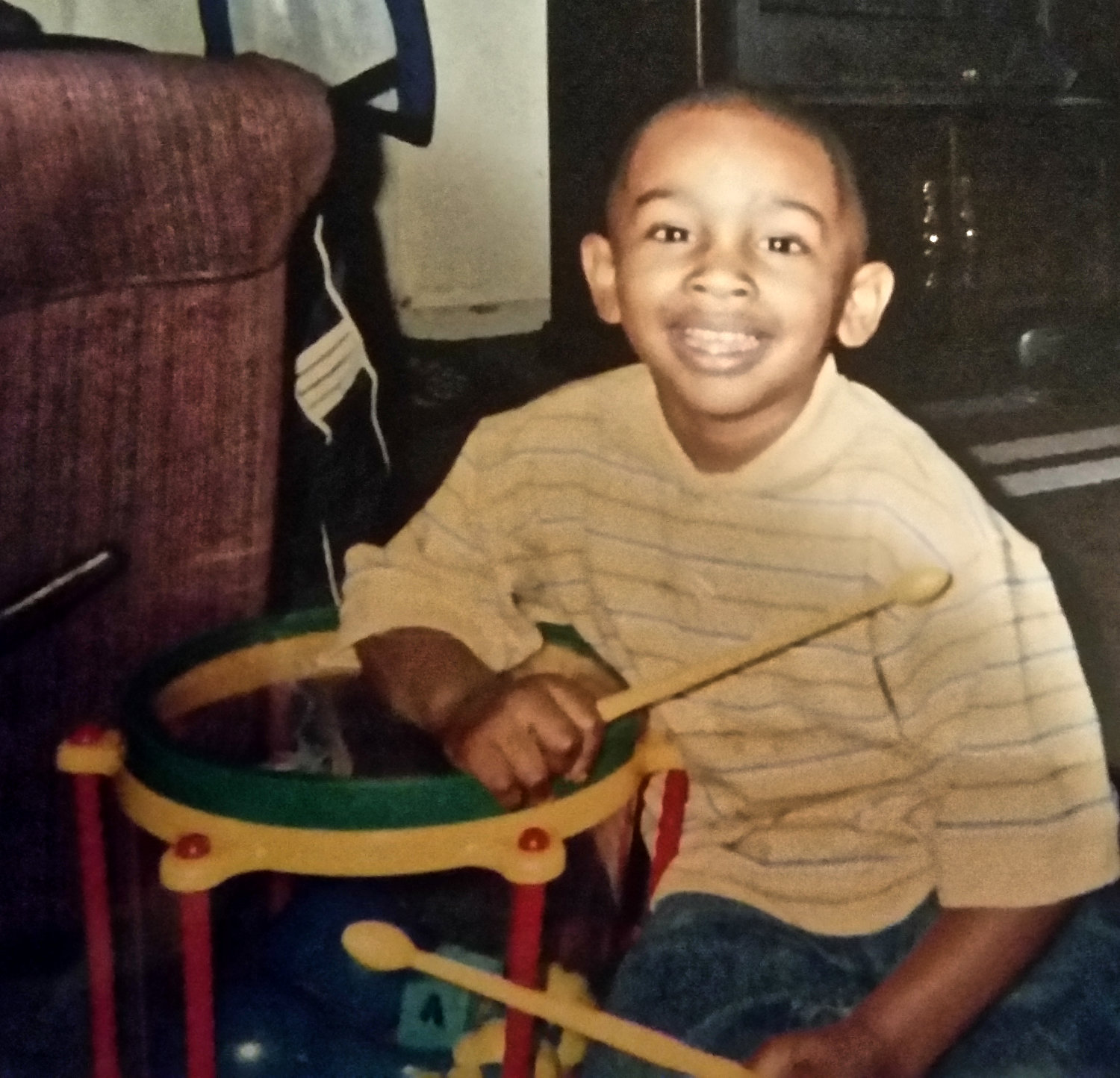 A young Jaylon Harper with his drums.